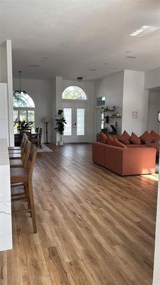 Dining room, Interior, Living room, Pendant Lights, Wood Texture Flooring