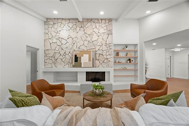Fireplace, Interior, Living room, Recessed Lighting, Stone Walls, Wood Texture Flooring