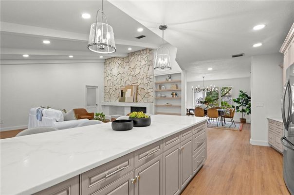Dining room, Fireplace, Interior, Kitchen, Pendant Lights, Recessed Lighting, Stone Walls, Wood Texture Flooring