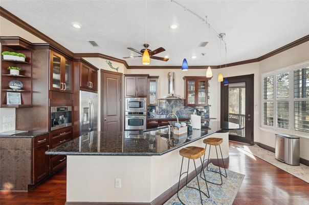 Interior, Kitchen, Pendant Lights, Recessed Lighting, Stainless Steel Appliances, Wood Texture Flooring