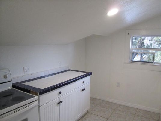 Interior, Kitchen, Recessed Lighting, Tile Countertops