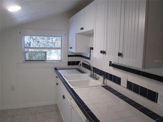 Interior, Kitchen, Recessed Lighting, Tile Countertops