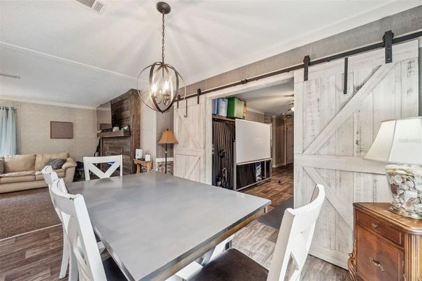 Dining room, Fireplace, Interior, Living room, Pendant Lights, Wood Texture Flooring