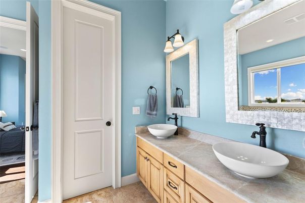 Bathroom, Dual Sink Vanities, Interior, Recessed Lighting, Tile Countertops