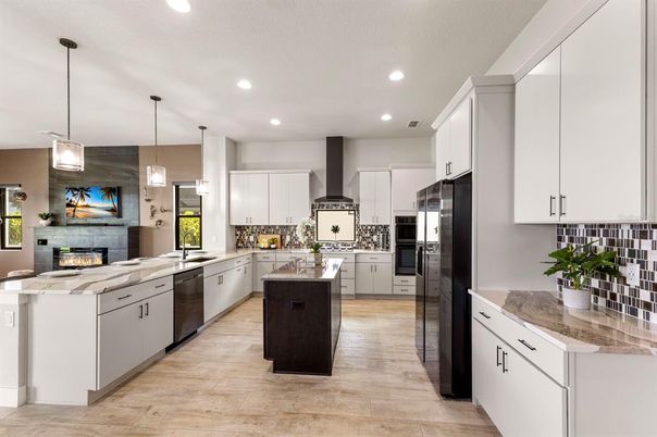 Fireplace, Interior, Kitchen, Pendant Lights, Recessed Lighting, Stainless Steel Appliances, Wood Texture Flooring