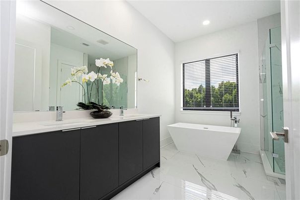 Bathroom, Dual Sink Vanities, Free Standing Baths, Glass Shower, Interior, Marble, Recessed Lighting