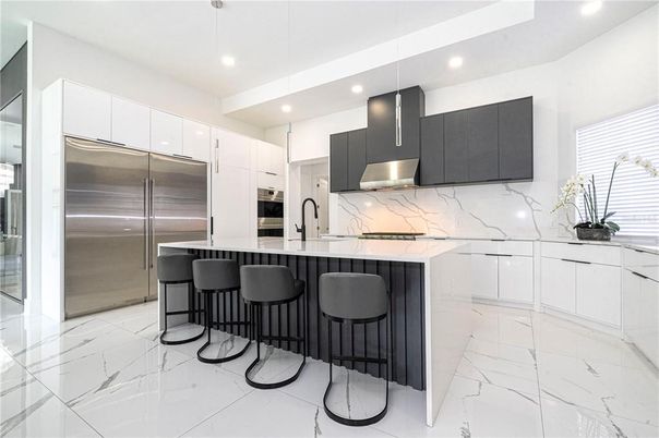Interior, Kitchen, Marble, Marble Walls, Pendant Lights, Recessed Lighting, Stainless Steel Appliances