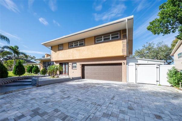 Attached, Exterior, Facade, Brick Facade, Modern