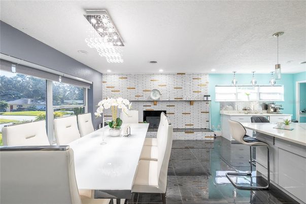 Dining room, Fireplace, Interior, Kitchen, Pendant Lights, Recessed Lighting, Stainless Steel Appliances, Stone Walls
