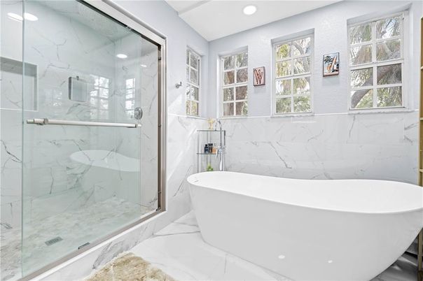 Bathroom, Free Standing Baths, Glass Shower, Interior, Marble, Marble Walls, Recessed Lighting