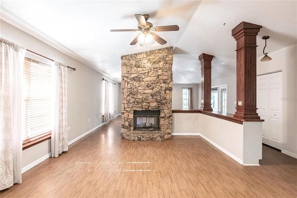 Empty room, Fireplace, Interior, Pendant Lights, Stone Walls, Wood Texture Flooring