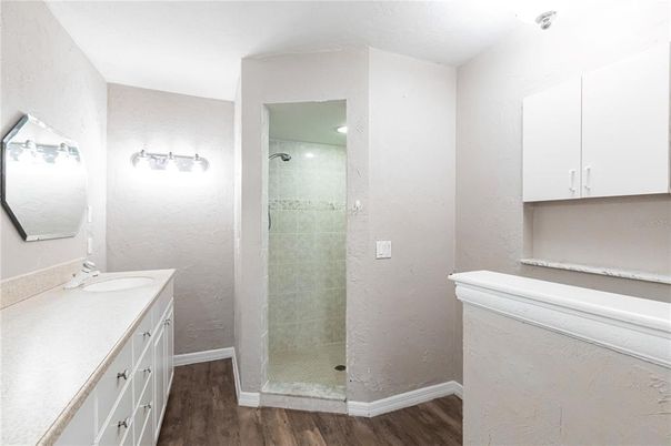 Bathroom, Glass Shower, Interior, Recessed Lighting, Wood Texture Flooring