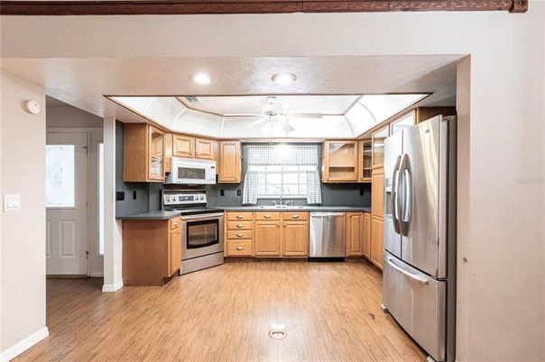 Interior, Kitchen, Recessed Lighting, Stainless Steel Appliances, Wood Texture Flooring