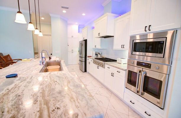 Interior, Kitchen, Marble, Pendant Lights, Recessed Lighting, Stainless Steel Appliances