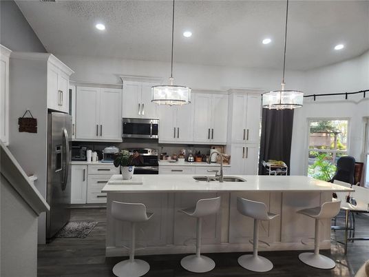 Interior, Kitchen, Pendant Lights, Recessed Lighting, Stainless Steel Appliances, Wood Texture Flooring