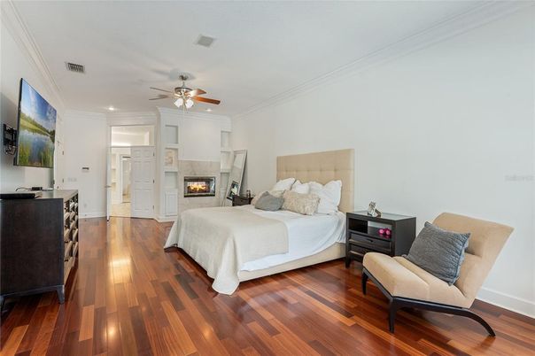 Bedroom, Fireplace, Interior, Recessed Lighting, Wood Texture Flooring