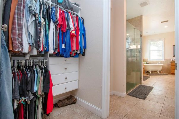 Bathroom, Free Standing Baths, Glass Shower, Interior, Recessed Lighting, Walk-in Closets