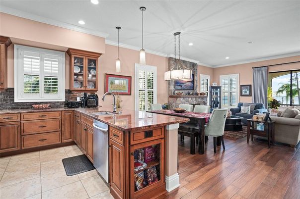 Dining room, Interior, Kitchen, Living room, Pendant Lights, Recessed Lighting, Stainless Steel Appliances, Wood Texture Flooring