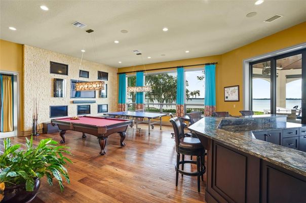 Billiard Table, Fireplace, Game Room, Interior, Pendant Lights, Recessed Lighting, Wood Texture Flooring
