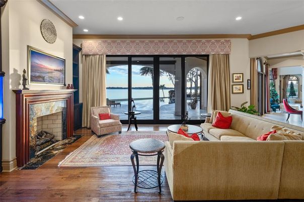 Fireplace, Interior, Living room, Recessed Lighting, Water, Wood Texture Flooring