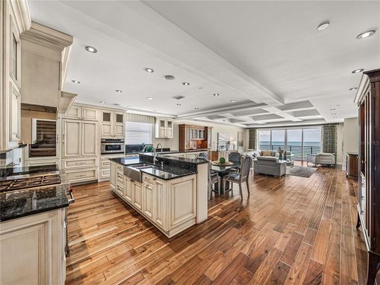 Dining room, Interior, Kitchen, Living room, Recessed Lighting, Stainless Steel Appliances, Wood Texture Flooring
