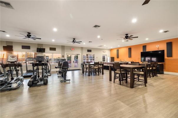 Dining room, Fitness Equipment, Gym, Interior, Recessed Lighting, Wood Texture Flooring