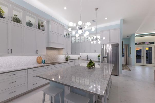 Interior, Kitchen, Marble, Pendant Lights, Recessed Lighting, Stainless Steel Appliances