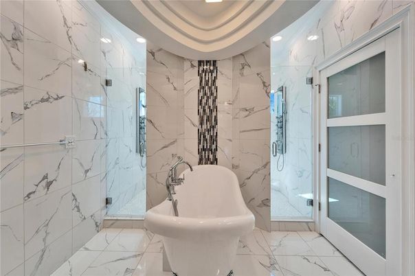 Bathroom, Free Standing Baths, Glass Shower, Interior, Marble, Marble Walls, Recessed Lighting