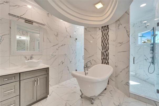 Bathroom, Dual Sink Vanities, Free Standing Baths, Glass Shower, Interior, Marble, Marble Walls, Recessed Lighting