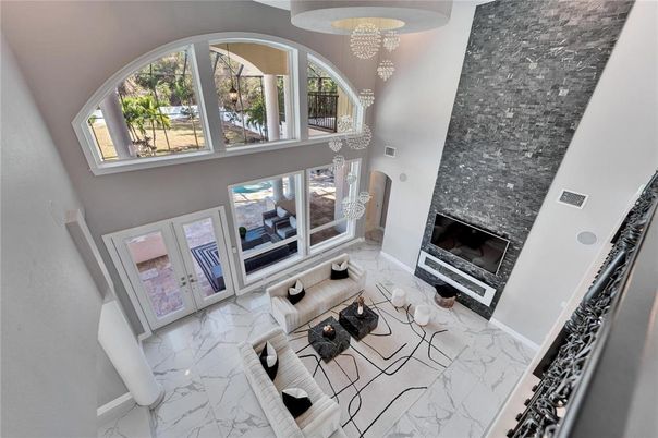 Chandelier, Fireplace, Interior, Living room, Marble