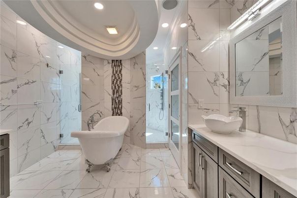 Bathroom, Dual Sink Vanities, Free Standing Baths, Glass Shower, Interior, Marble, Marble Walls, Recessed Lighting