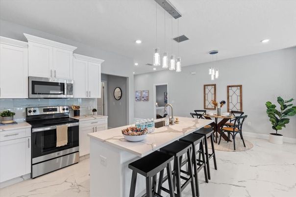 Dining room, Interior, Kitchen, Marble, Pendant Lights, Recessed Lighting, Stainless Steel Appliances