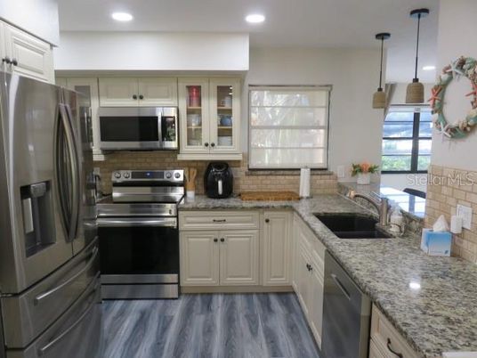 Interior, Kitchen, Pendant Lights, Recessed Lighting, Stainless Steel Appliances, Wood Texture Flooring