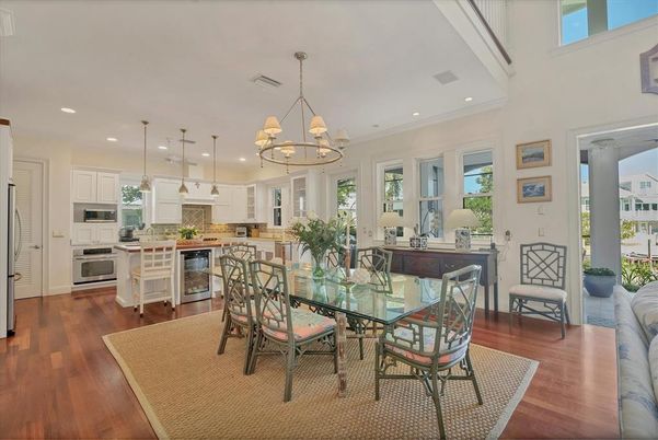 Chandelier, Dining room, Interior, Kitchen, Pendant Lights, Recessed Lighting, Stainless Steel Appliances, Wood Texture Flooring