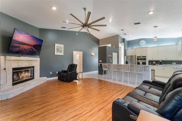 Home Theatre Room, Fireplace, Interior, Kitchen, Living room, Pendant Lights, Recessed Lighting, Wood Texture Flooring