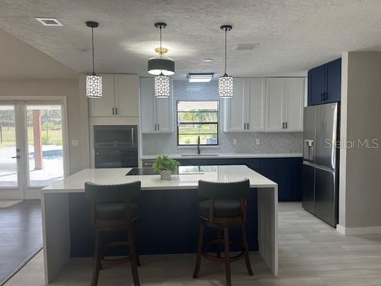 Interior, Kitchen, Pendant Lights, Stainless Steel Appliances, Wood Texture Flooring