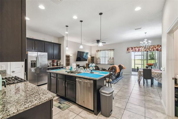 Chandelier, Dining room, Interior, Kitchen, Pendant Lights, Recessed Lighting, Stainless Steel Appliances