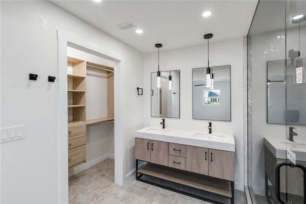 Bathroom, Dual Sink Vanities, Glass Shower, Interior, Pendant Lights, Recessed Lighting