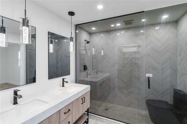 Bathroom, Dual Sink Vanities, Glass Shower, Interior, Pendant Lights, Recessed Lighting