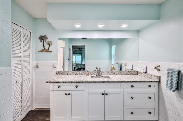 Bathroom, Dual Sink Vanities, Interior, Recessed Lighting, Wood Texture Flooring