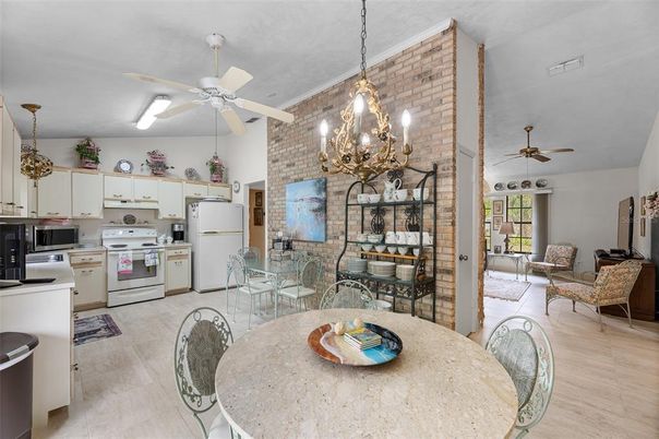 Chandelier, Dining room, Interior, Kitchen, Pendant Lights, Stone Walls, Wood Texture Flooring