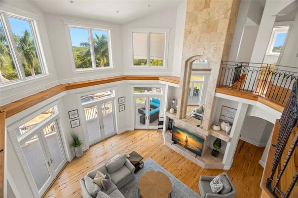 Fireplace, Interior, Living room, Recessed Lighting, Stone Walls, Wood Texture Flooring