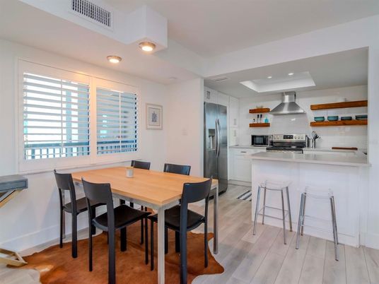 Dining room, Interior, Kitchen, Recessed Lighting, Stainless Steel Appliances, Wood Texture Flooring