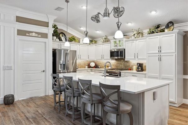 Interior, Kitchen, Pendant Lights, Recessed Lighting, Stainless Steel Appliances, Wood Texture Flooring