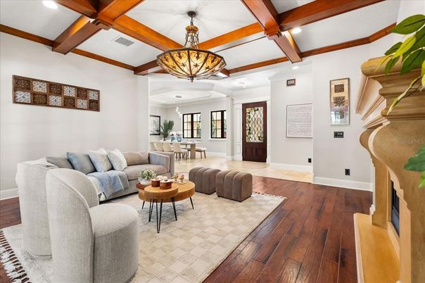Dining room, Fireplace, Interior, Living room, Pendant Lights, Recessed Lighting, Wooden Beams, Wood Texture Flooring