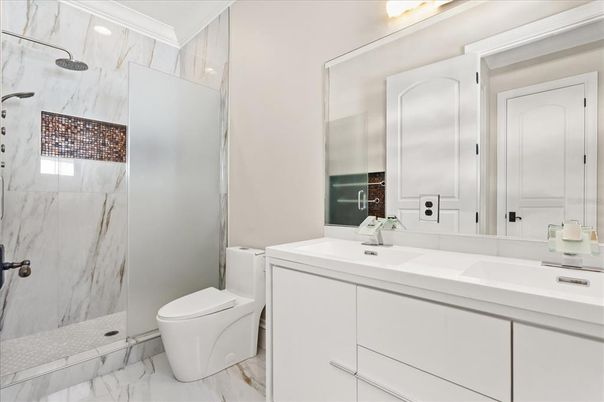 Bathroom, Dual Sink Vanities, Interior, Marble, Marble Walls, Recessed Lighting