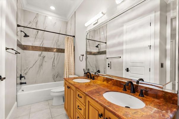 Bathroom, Dual Sink Vanities, Glass Shower, Interior, Marble Walls, Recessed Lighting