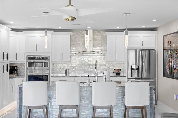 Interior, Kitchen, Pendant Lights, Recessed Lighting, Stainless Steel Appliances, Stone Walls