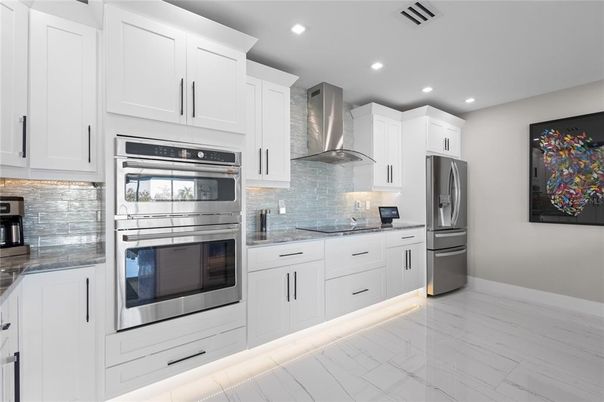 Interior, Kitchen, Marble, Recessed Lighting, Stainless Steel Appliances, Wood Texture Flooring