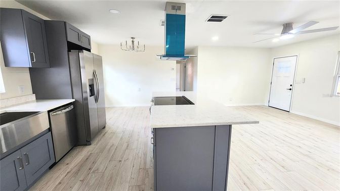 Interior, Kitchen, Recessed Lighting, Stainless Steel Appliances, Wood Texture Flooring